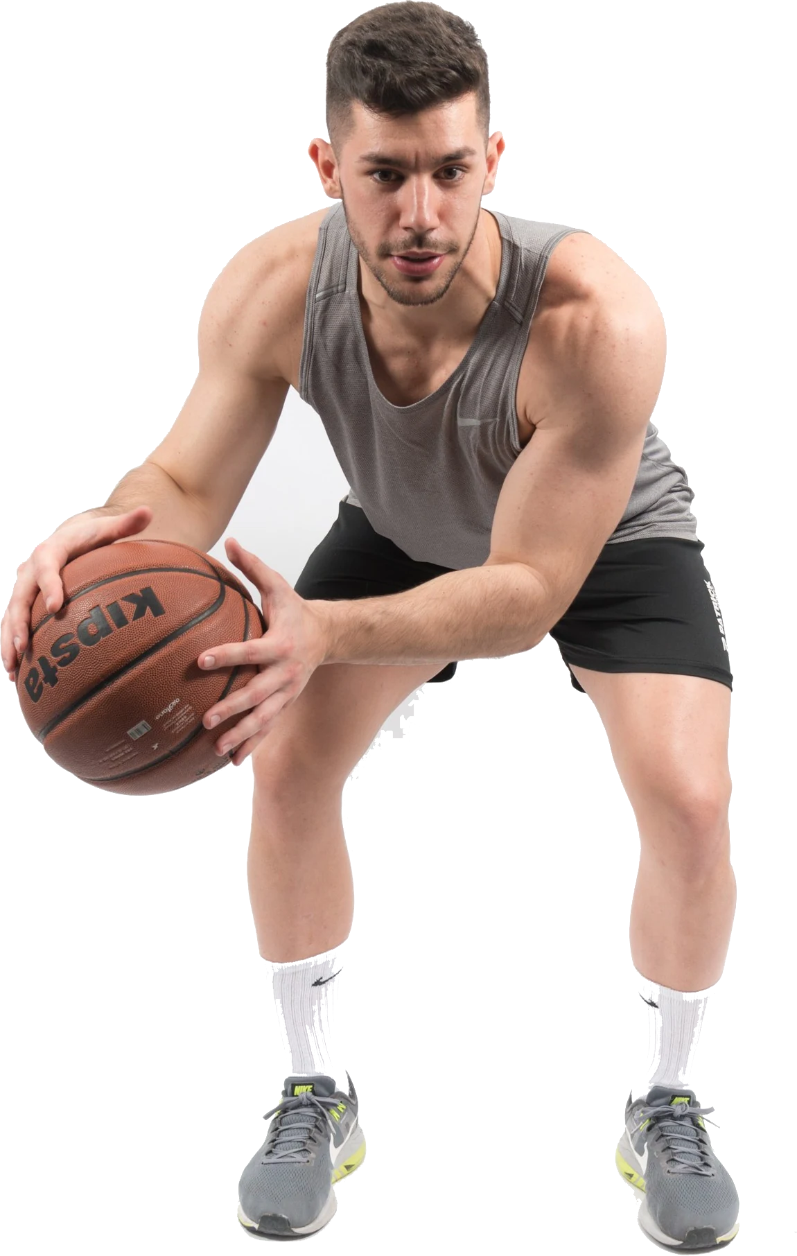 Jugador de baloncesto botando el balón
